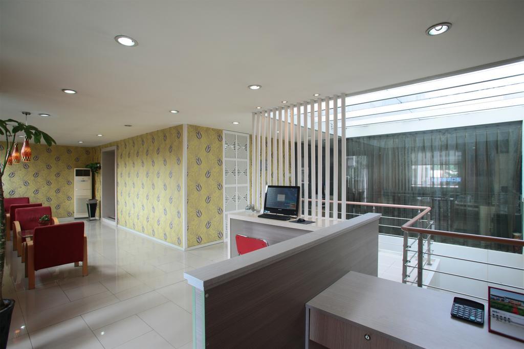 Qingdao Renjia Bussiness Hotel Exterior foto